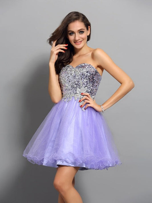 A-Line/Princess Sweetheart Homecoming Dresses Claudia Cocktail Beading Applique Sleeveless Short Net Dresses