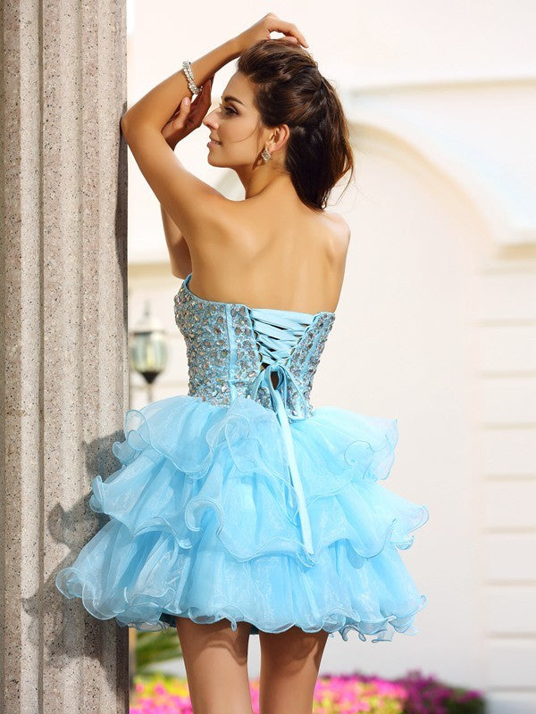 A-Line/Princess Cocktail Dulce Homecoming Dresses Sweetheart Beading Sleeveless Short Organza Dresses